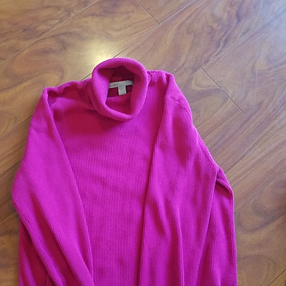 Bright pink turtleneck sweater
